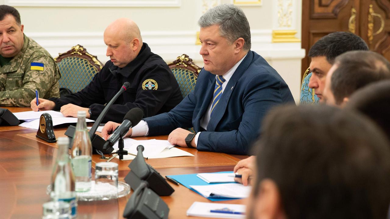 President of Ukraine Petro Poroshenko (C) leading a session of the National Security and Defence Council of Ukraine in Kiev following an incident in the Black Sea off Moscow-annexed Crimea. Picture: AFP/Ukrainian Presidential Press Service