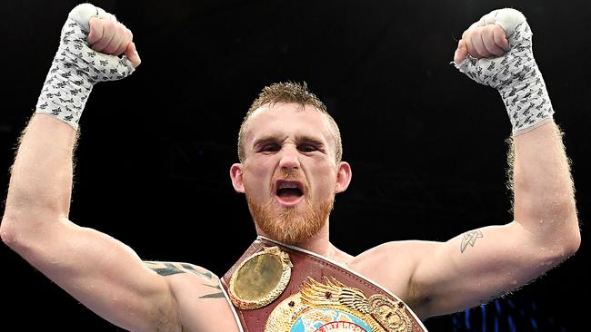 Brisbane’s Dennis Hogan celebrates beating Jamie Weetch in December. Picture: Getty Images