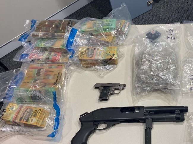 Cash, drugs and guns seized from two north Brisbane homes. Picture: Queensland Police Service