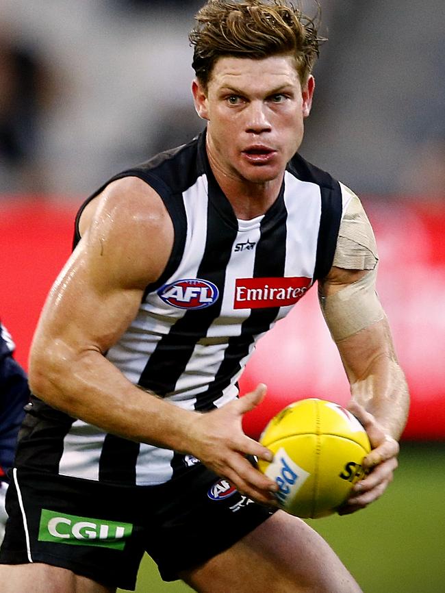 Taylor Adams wins a hard ball for the Pies. Picture: Wayne Ludbey