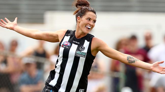 Sharni Layton of the Magpies celebrates her goal.