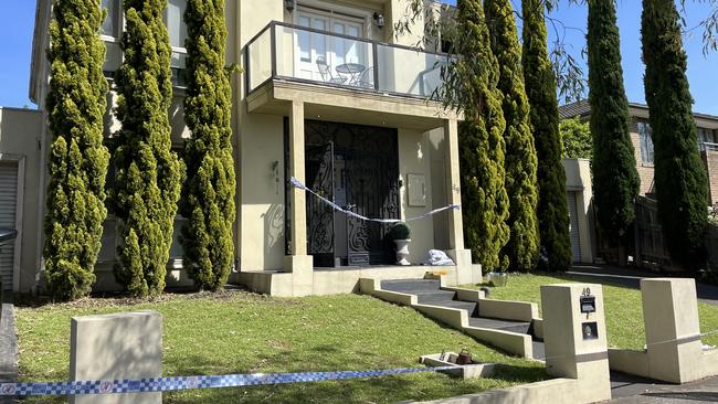 Police tape surrounds the Mill Park home on New Year’s Day. Picture: Regan Hodge