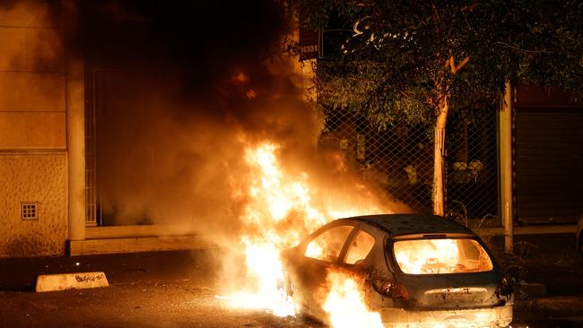 A burning car during protests in Nanterre, a day after the killing of a 17-year-old boy in Nanterre by a police officer's gunshot following a refusal to comply. Picture: AFP