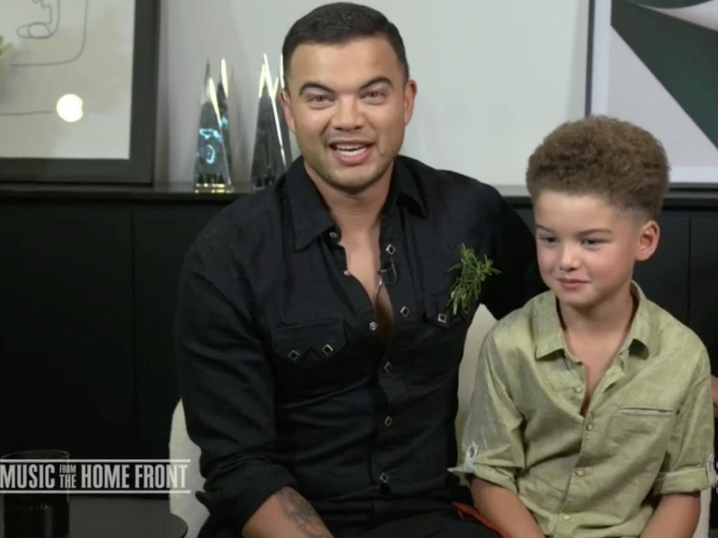 Guy Sebastian with son Hudson at home.