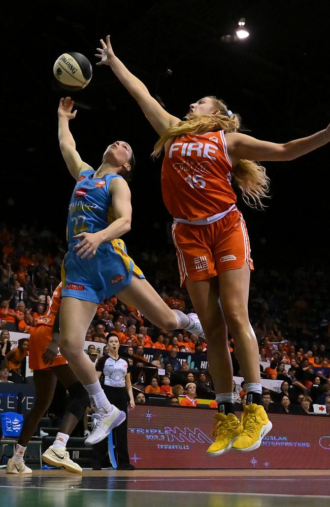 Kelly Wilson of the Spirit and Lauren Cox of the Townsville Fire compete for the ball during the round three WNBL match between Townsville Fire and Bendigo Spirit at Townsville Entertainment Centre, on November 16, 2024, in Townsville, Australia. (Photo by Albert Perez/Getty Images)