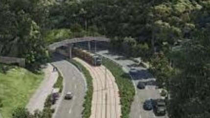 Light rail stage four on the Gold Coast – what the trams will look like going under an overhead wildlife bridge at Burleigh headland.