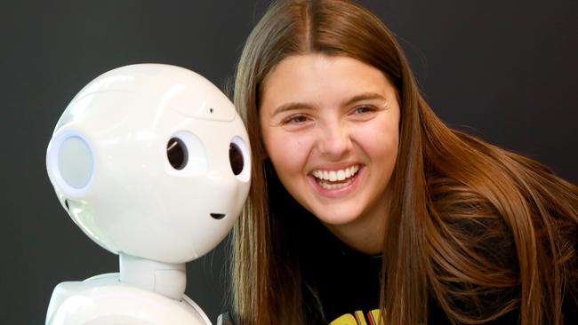 Western Sydney University student Sandra Gorgeuska with Pepper the robot ahead of a robots demonstration at Parramatta Library next week. Picture: Angelo Velardo