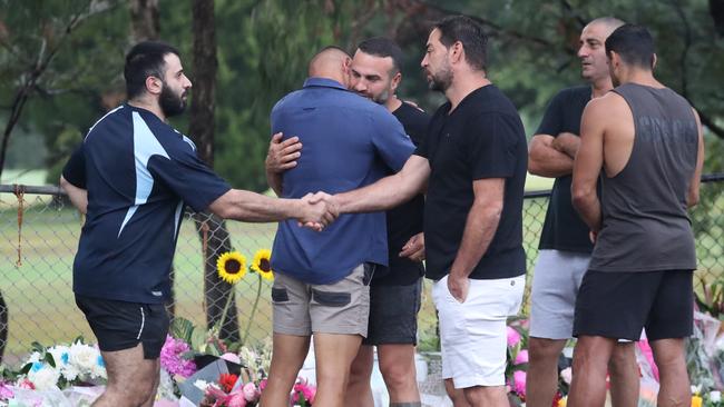 Danny Abdallah (centre) is embraced after the tragedy in 2020. The site could become a permanent tribute with plaques. Picture: John Grainger