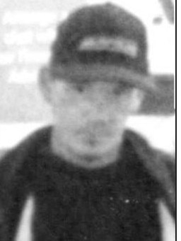 A grainy photo released by police following the robbery.