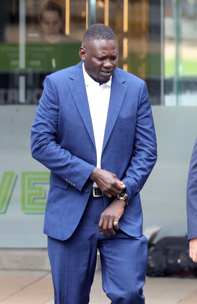 Santo Wal, heads into court, before the verdict in trial of Zillmere 12 accused of murdering Girum Mekonnen, in a Zillmere park in 2020, Brisbane Supreme Court – on Wednesday 12th March 2025 – Photo Steve Pohlner