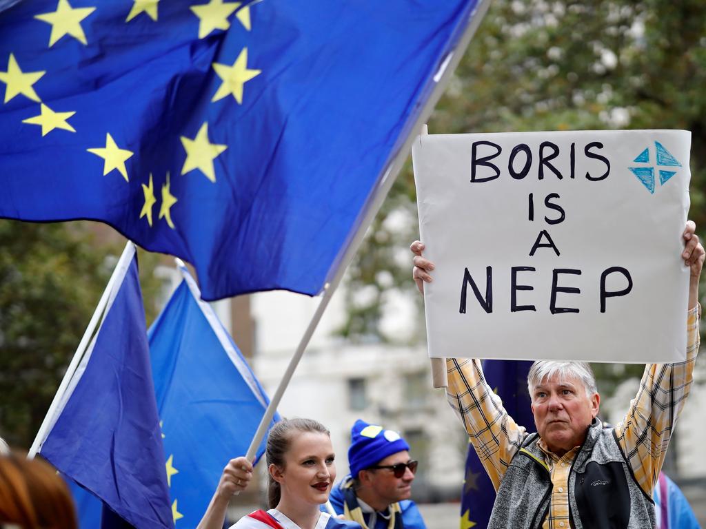 Anti-Brexit activists, and demonstrators opposing the British government's actions in relation to the handling of Brexit, protest near Downing Street in central London. Picture: AFP