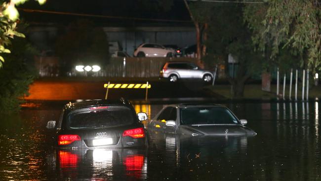 Flood waters have risen at Lansvale causing flooding and evacuations, including motorists who ignored warning and drove through flood waters. Picture: Bill Hearne