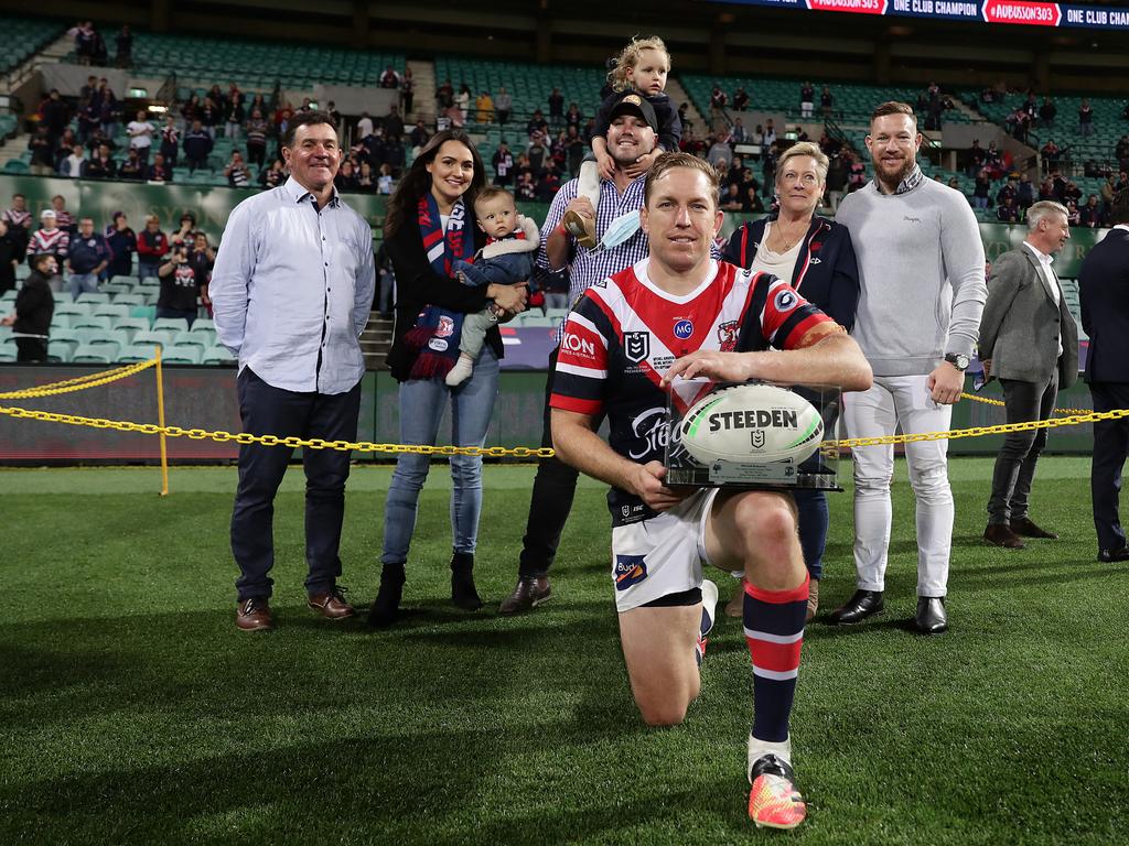 A family photo in the age of COVID as Aubusson celebrates his Roosters record.