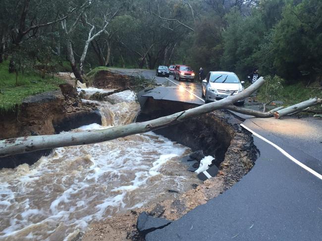 Part of the Montacute Rd, Athelstone, washed away. Picture: Roy Van Der Vegt