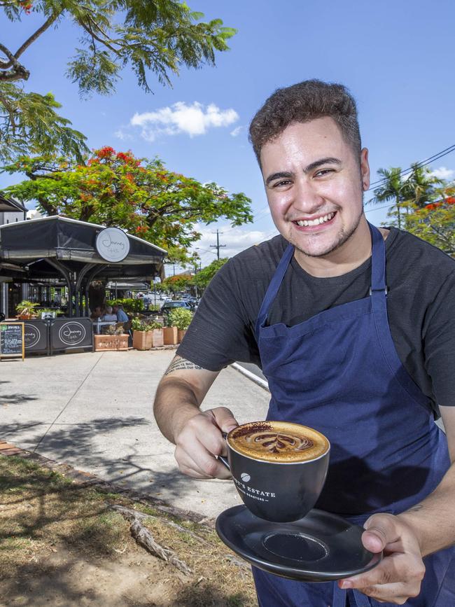 Business confidence is up after racing returned to Eagle Farm Racecourse last month. It’s all smiles for Alex Sterling, lead barista at Journey Cafe and Bar. PICTURE: AAP/Renae Droop