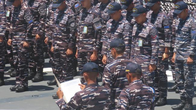 The crew of Indonesia’s KRI I Gusti Ngurah Rai on parade before departing Kuru Wharf. Picture: Harry Brill.