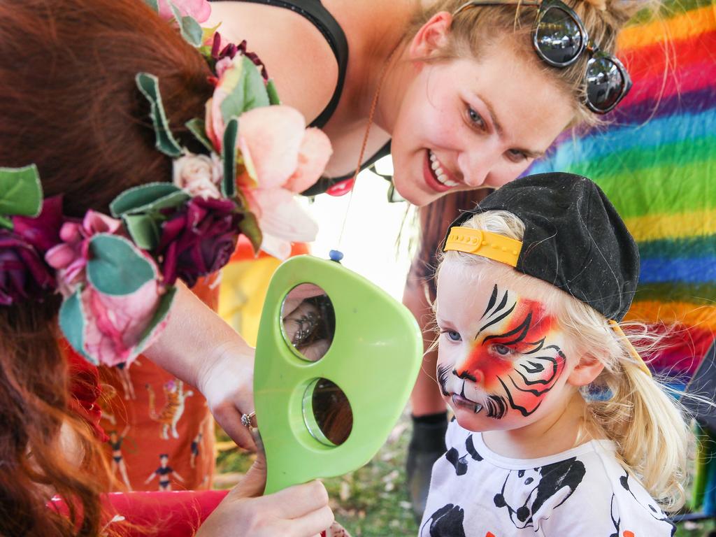 Heidi Dickens, 2, surveys her painted face. Picture: Jess Husband.