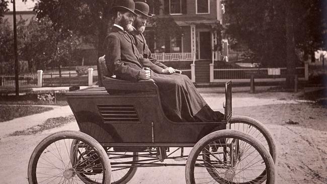 Twin brother inventors, Francis and Freelan Stanley, in an early model of their Stanley Steamer in 1898.