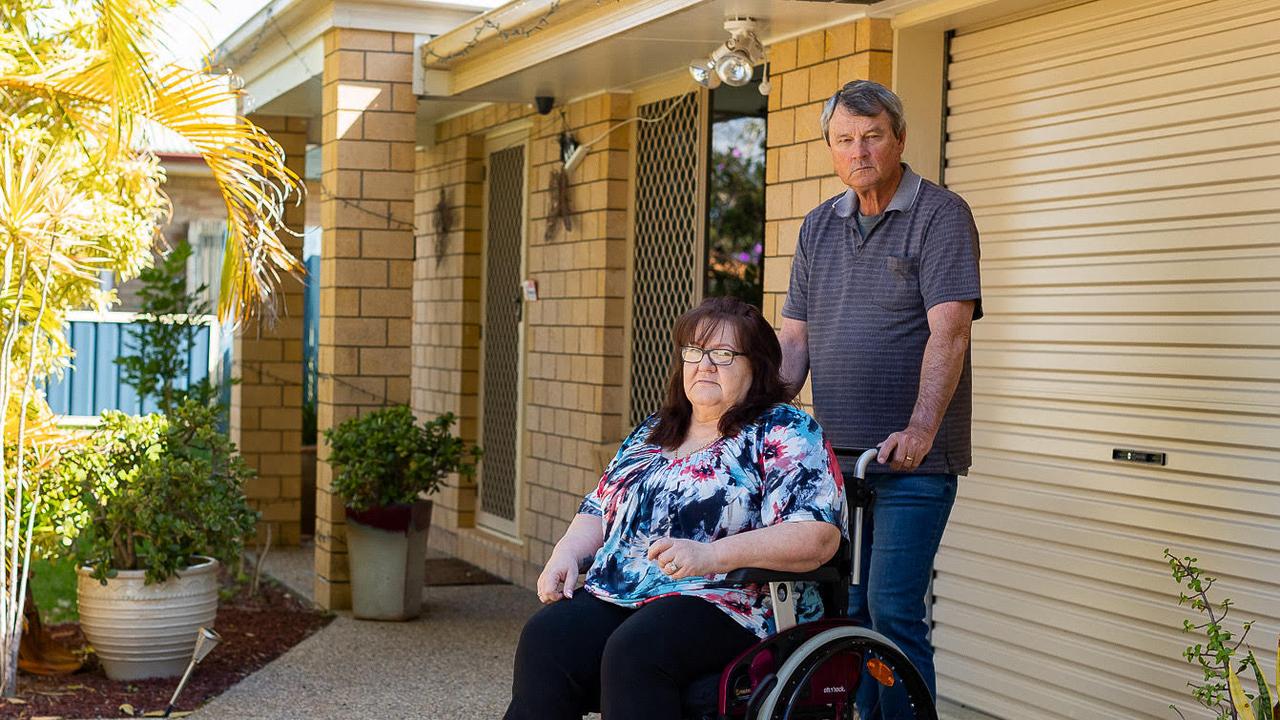 Jennifer Arnold relies on a wheelchair and care from her husband Mark Jenkins after a spine surgeon she claims went wrong in 2018.