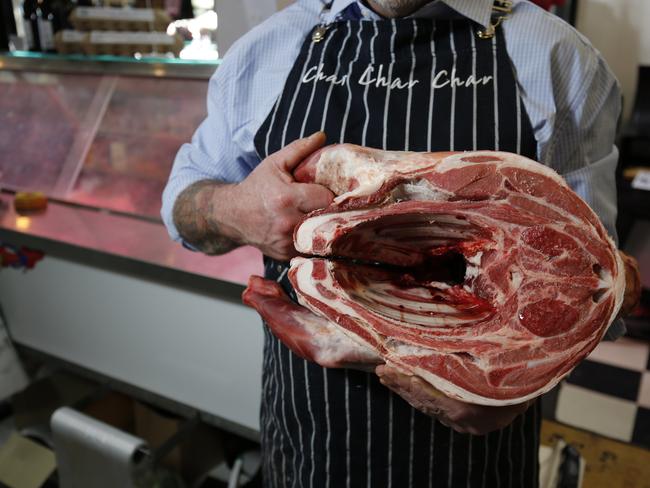 Glenn Dumbrell holds a shoulder of saltbush Dorper lamb. Picture: Simon Baker