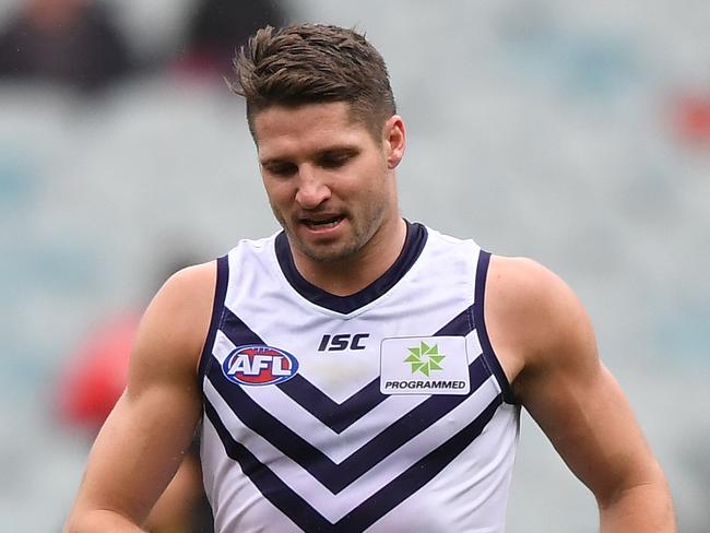 Jesse Hogan of the Dockers is seen after sustaining an  during the Round 14 AFL match between the Melbourne Demons and the Fremantle Dockers at the MCG in Melbourne, Saturday, June 22, 2019.  (AAP Image/Julian Smith) NO ARCHIVING, EDITORIAL USE ONLY