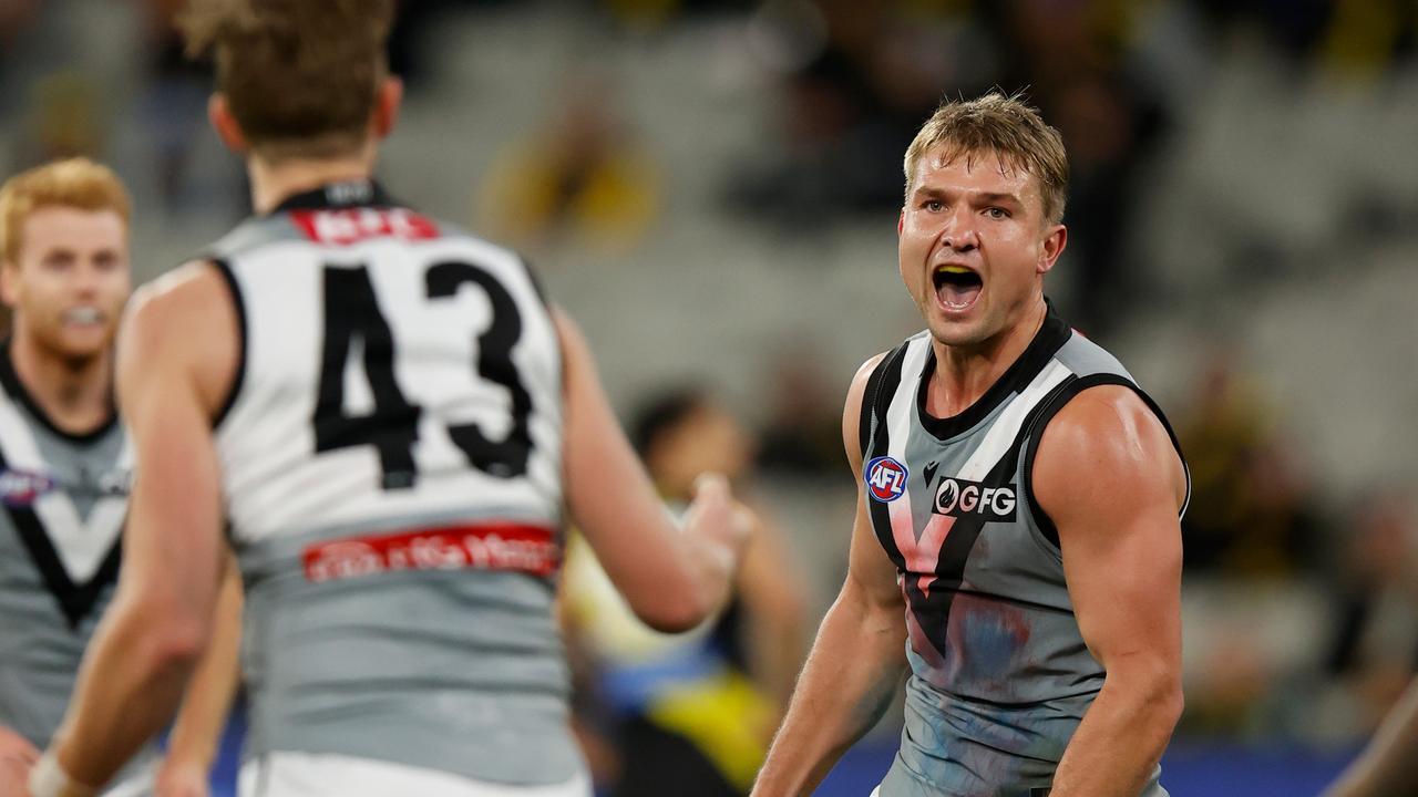 Ollie Wines celebrates a goal in the third term. Picture: Michael Willson/AFL Photos via Getty Images