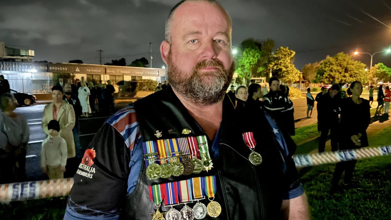 Rohan Laidlaw proudly wearing his father's grandfather's and great grandfather's war medals at Mackay Anzac Day 2022 at Jubilee Park Dawn Service. Picture: Janessa Ekert