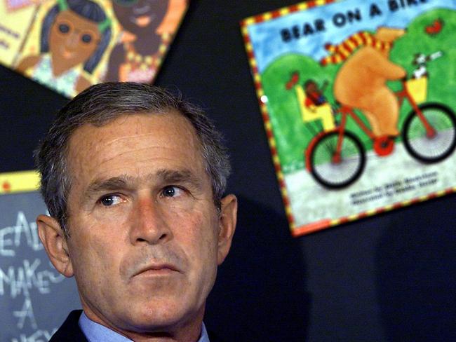 Waiting....waiting...waiting...US President George W Bush “reacts” after having his early morning school reading event interupted by his Chief of Staff shortly after news of the World Trade Centre attack.