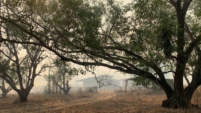 Firefighters were battling a bushfire spreading on multiple fronts near the Girraween Golf Course and Humpty Doo on Sunday afternoon. Picture: Katrina Bridgeford