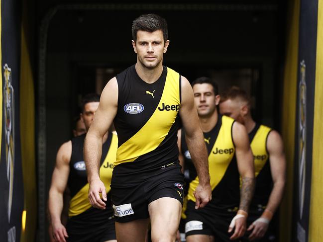 MELBOURNE, AUSTRALIA - AUGUST 07: Trent Cotchin of the Tigers leads the Tigers out during the round 21 AFL match between Richmond Tigers and North Melbourne Kangaroos at Melbourne Cricket Ground on August 07, 2021 in Melbourne, Australia. (Photo by Daniel Pockett/AFL Photos/via Getty Images)