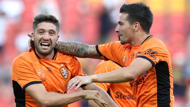 Brisbane Roar forward Brandon Borrello (left) celebrates scoring against Perth Glory with teammate Jamie Maclaren.