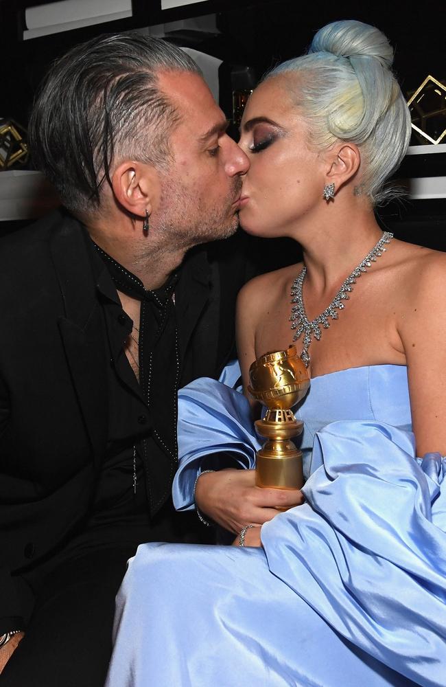 Christian Carino and Lady Gaga flaunted PDA post-Globes. Picture: Getty Images for InStyle