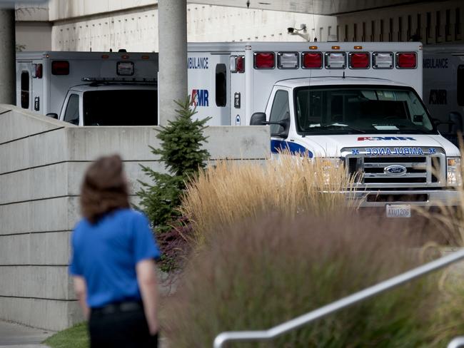 Ambulances line up in the emergency area of Sacred Heart Hospital following reports of a shooting at Freeman High School. Picture: Kathy Plonka/The Spokesman-Review via AP