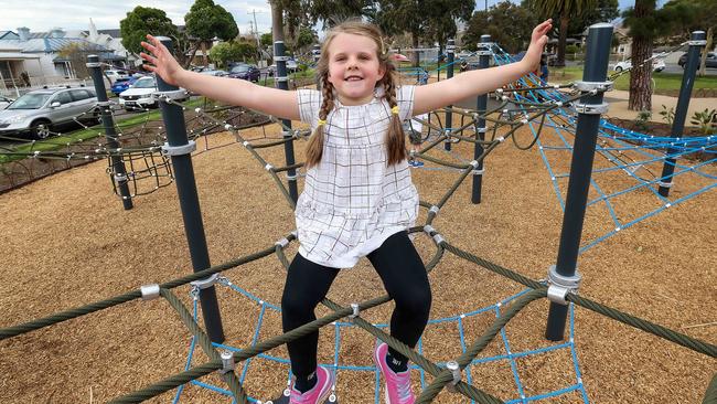 Five-year-old Billie climbs the ropes. Picture: Ian Currie