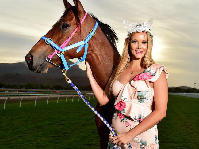 Georgie Gosden with 8yo Thoroughbred 'Confronting' at Townsville Turf Club ahead of the Melbourne Cup. Picture: Alix Sweeney