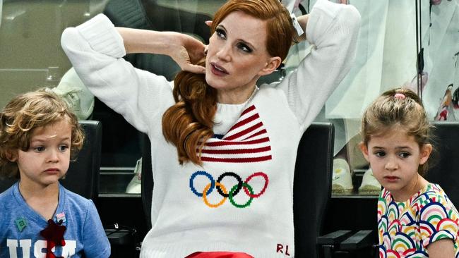 US actor Jessica Chastain wears the Ralph Lauren jumper to the gymnastics. Pictures: AFP