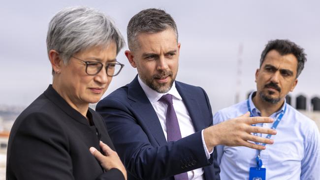 Senator Wong, left, and Australian Representative to the Palestinian Territories Edward Russell, centre, meet with victims of settler violence in Ramallah, in the West Bank. Picture: DFAT