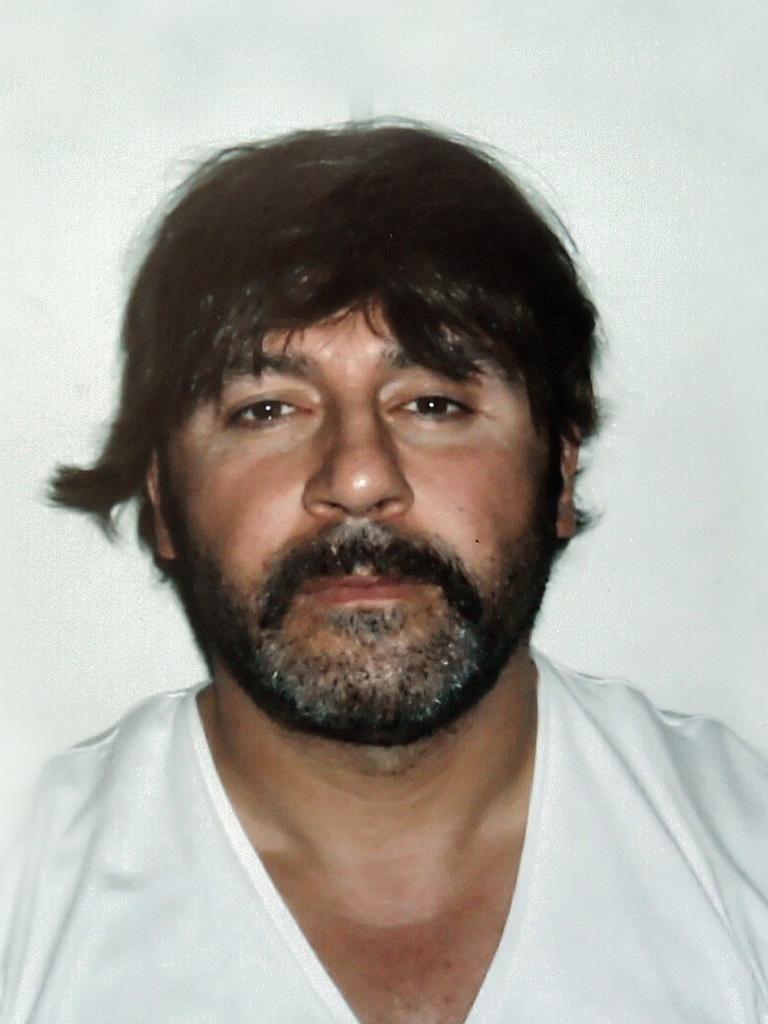 Former drug boss and ex-Brunswick resident Tony Mokbel, wearing a wig after he was arrested in Greece, in 2007. Picture: Supplied.