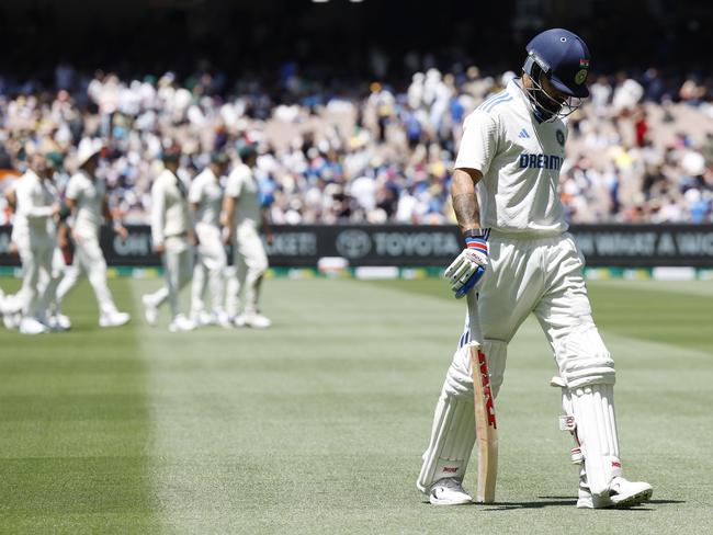 NCA. MELBOURNE, AUSTRALIA. 30th December 2024.  Day 5 of the Boxing Day Test match at the MCG .  Virat Kohli trudges off the MCG after being dismissed just before lunch    .  Picture: Michael Klein