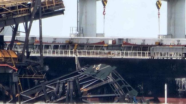 Photos of damage to the port at Groote Eylandt after it was struck by a bulk carrier during Cyclone Megan.