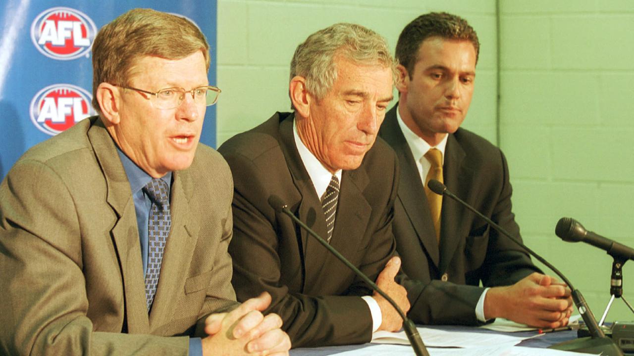 Wayne Jackson with AFL chairman Ron Evans and Ben Buckley in 2000.