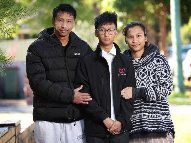 Benjamin with his parents Kirati Phikhohpoom and Wannisa Srichan. Picture: David Caird