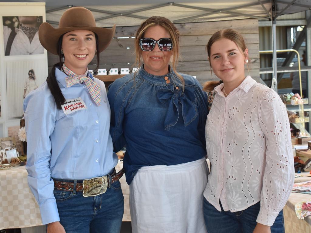 Rockhampton's Zara Benjamin with Shaniya and Zoe Corrie at the APRA National Finals Rodeo at CQLX Gracemere on November 9, 2024.