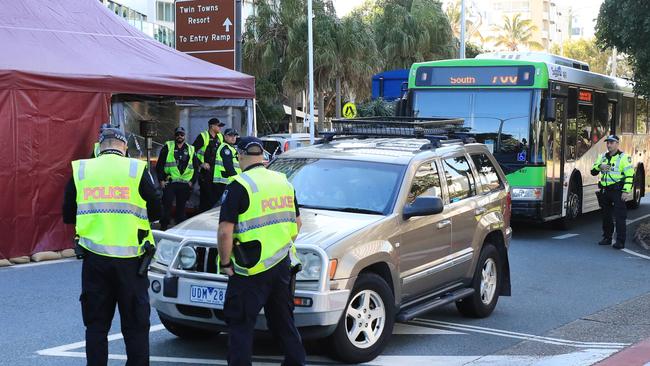 Queensland Police stop and turn Victorian vehicles around for a secondary check at the Griffith Street Coolangatta QLD/NSW Border Checkpoint Picture Scott Powick