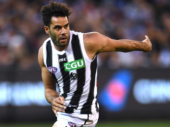 Daniel Wells of the Magpies is seen in action during the Round 12 AFL match between the Melbourne Demons and the Collingwood Magpies at the MCG in Melbourne, Monday, June 11, 2018. (AAP Image/Julian Smith) NO ARCHIVING, EDITORIAL USE ONLY