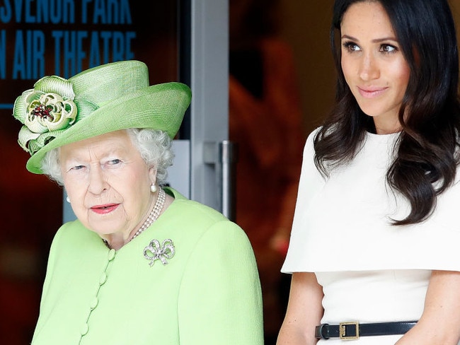 Queen Elizabeth II and the Duchess of Sussex arrive to visit Storyhouse Chester, where they will be taken on a tour of the building before unveiling a plaque to mark the official opening. (Photo by Martin Rickett/PA Images via Getty Images)