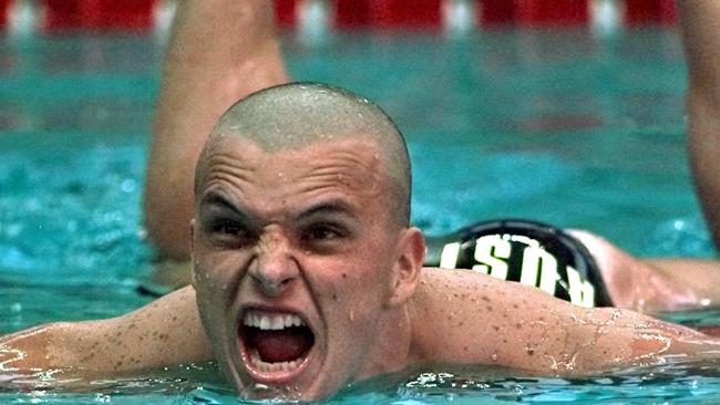 Swimmer Scott Miller of Australia shows his disappointment after finishing second in men's final of 100 butterfly event at the 1996 Olympic Games in Atlanta. Picture: AP