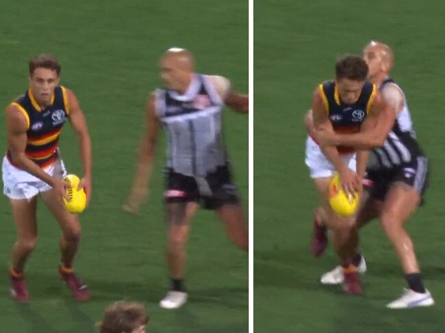 Lachie Sholl gets tackled by Sam Powell-Pepper.