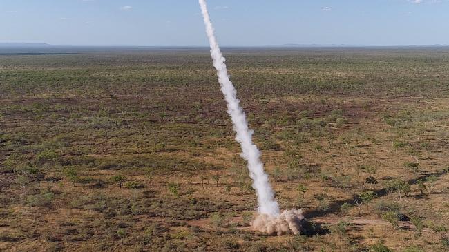 A United States Marine Corps M142 High Mobility Artillery Rocket System (HIMARS), part of the Marine Rotational Force - Darwin, fires a guided rocket against targets on Bradshaw Field Training Area in the Northern Territory. Picture: Petty Officer Peter Thompson/Defence