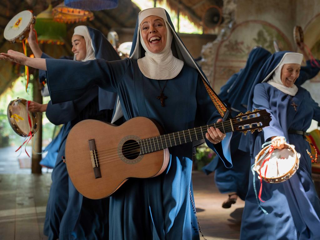 Olivia Colman as a silly singing nun.